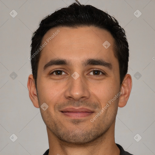 Joyful white young-adult male with short  black hair and brown eyes