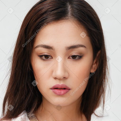 Neutral white young-adult female with long  brown hair and brown eyes