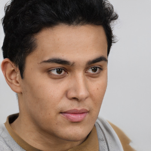 Neutral latino young-adult male with short  brown hair and brown eyes