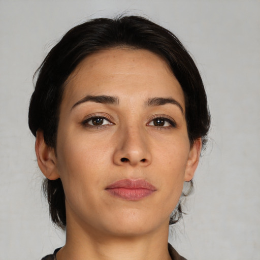 Joyful asian young-adult female with medium  brown hair and brown eyes