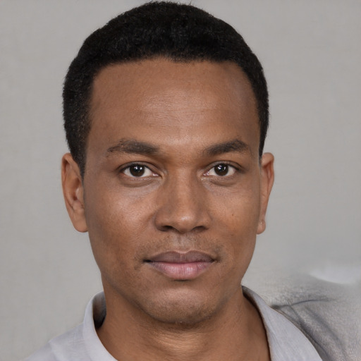 Neutral white young-adult male with short  black hair and brown eyes