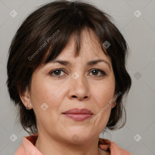 Joyful white adult female with medium  brown hair and brown eyes