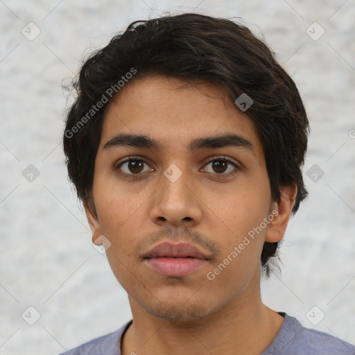 Neutral white young-adult male with short  black hair and brown eyes