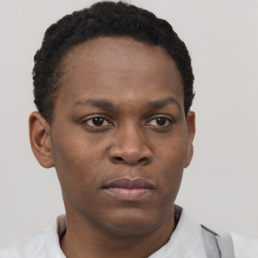 Neutral black young-adult female with short  black hair and brown eyes
