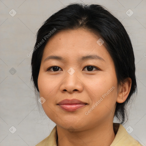 Joyful asian young-adult female with medium  brown hair and brown eyes