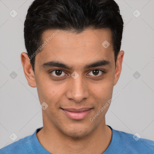 Joyful latino young-adult male with short  brown hair and brown eyes