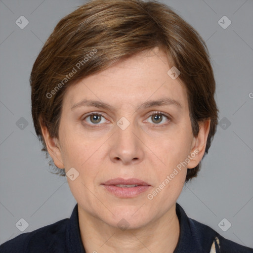 Joyful white adult female with medium  brown hair and grey eyes