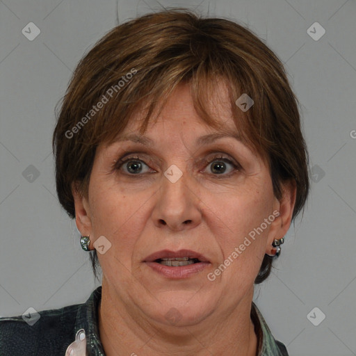 Joyful white adult female with medium  brown hair and grey eyes