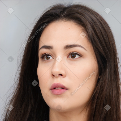 Neutral white young-adult female with long  brown hair and brown eyes