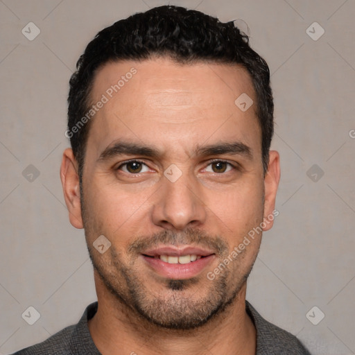 Joyful white young-adult male with short  black hair and brown eyes