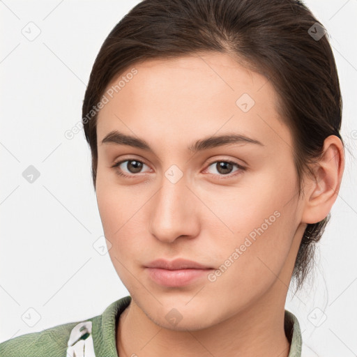 Neutral white young-adult female with medium  brown hair and brown eyes