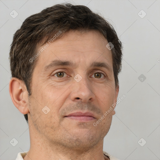 Neutral white adult male with short  brown hair and brown eyes