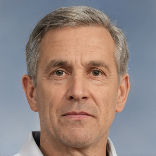 Neutral white middle-aged male with short  gray hair and brown eyes