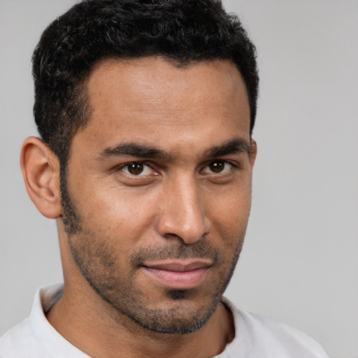 Neutral black young-adult male with short  brown hair and brown eyes