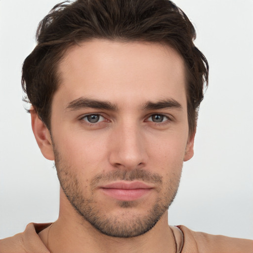 Neutral white young-adult male with short  brown hair and brown eyes