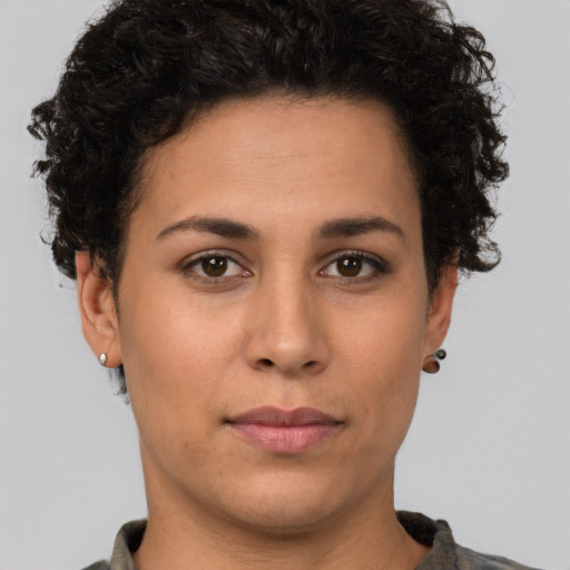 Neutral latino young-adult female with short  brown hair and brown eyes