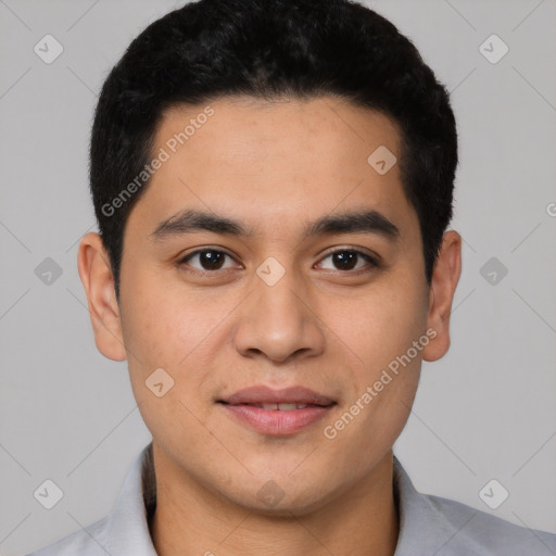 Joyful latino young-adult male with short  black hair and brown eyes