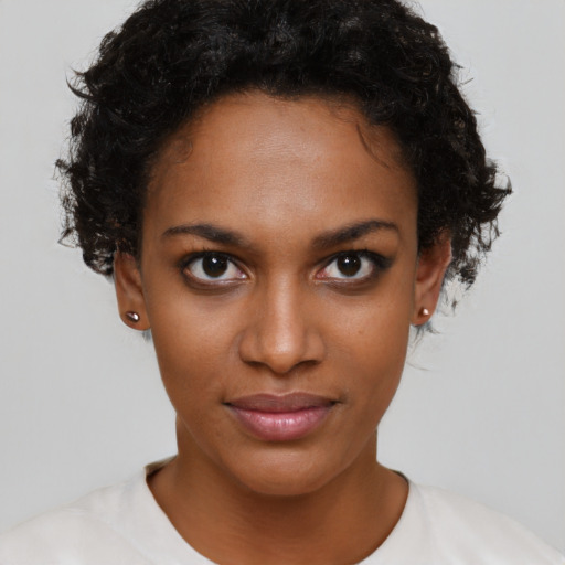 Neutral black young-adult female with short  brown hair and brown eyes