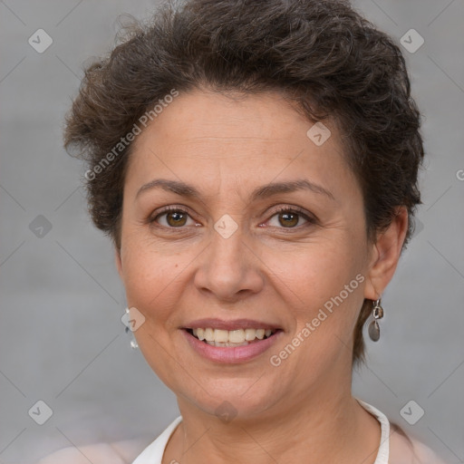 Joyful white adult female with short  brown hair and brown eyes