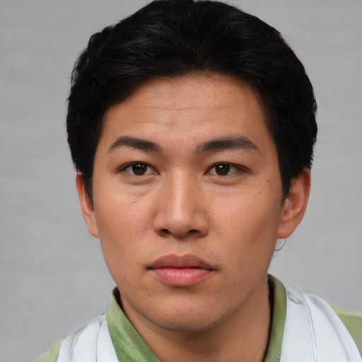 Neutral asian young-adult male with short  black hair and brown eyes
