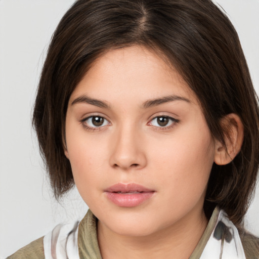 Neutral white young-adult female with medium  brown hair and brown eyes