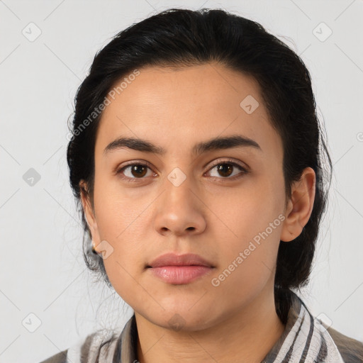 Neutral latino young-adult female with medium  black hair and brown eyes