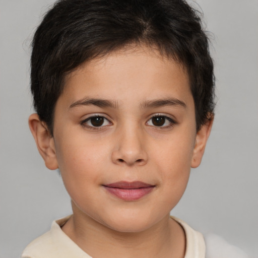 Joyful white child female with short  brown hair and brown eyes