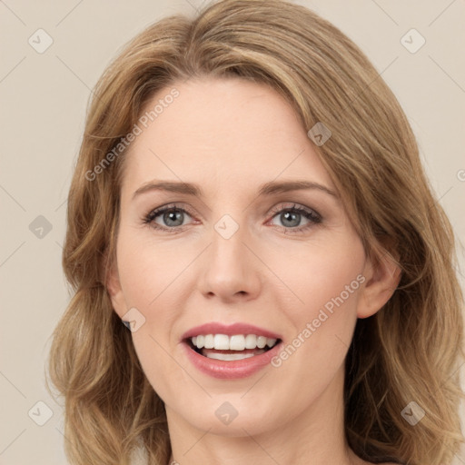 Joyful white young-adult female with medium  brown hair and green eyes