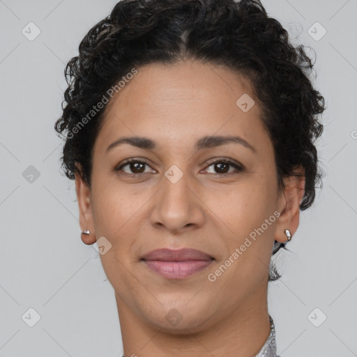 Joyful latino young-adult female with short  brown hair and brown eyes