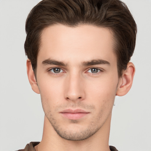 Neutral white young-adult male with short  brown hair and brown eyes