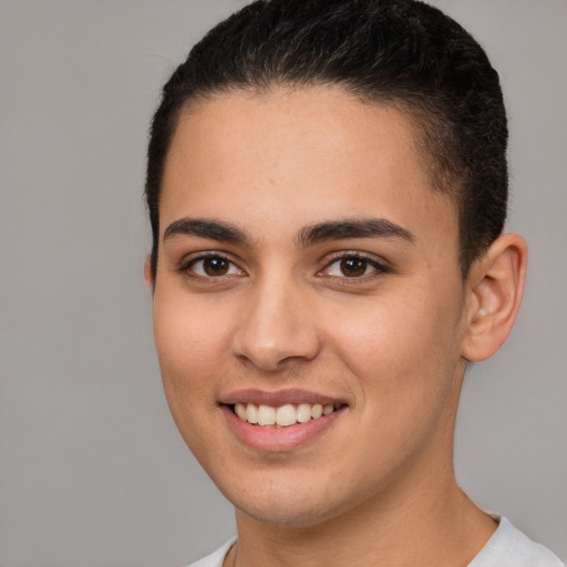 Joyful white young-adult female with short  brown hair and brown eyes