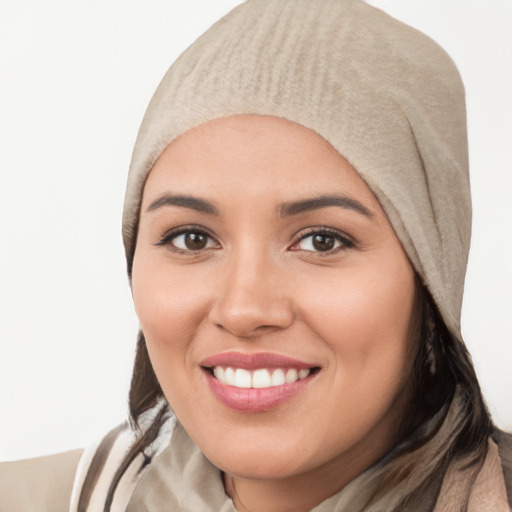 Joyful white young-adult female with medium  black hair and brown eyes