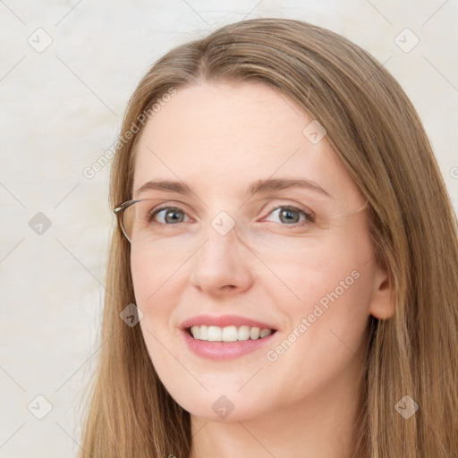 Joyful white young-adult female with long  brown hair and green eyes