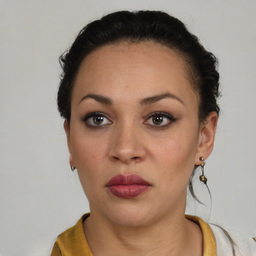 Neutral latino young-adult female with short  brown hair and brown eyes