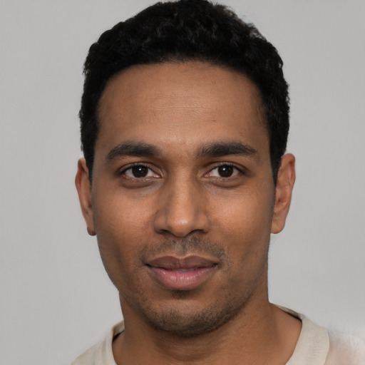 Neutral black young-adult male with short  black hair and brown eyes
