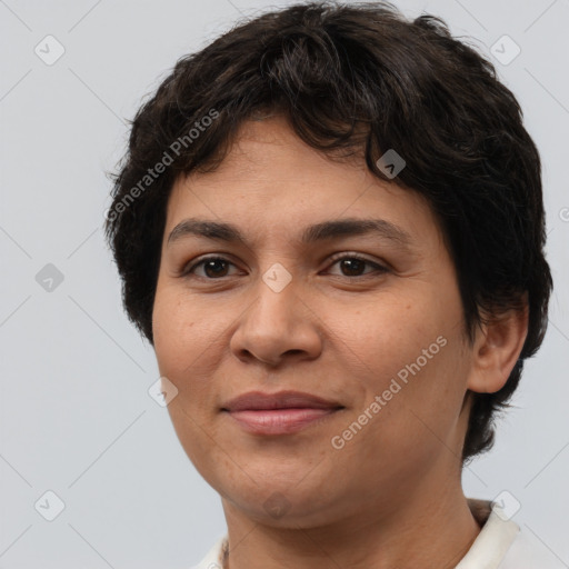 Joyful white adult female with short  brown hair and brown eyes