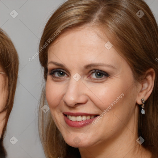 Joyful white adult female with medium  brown hair and brown eyes