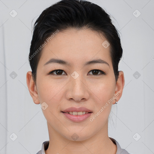 Joyful asian young-adult female with short  black hair and brown eyes