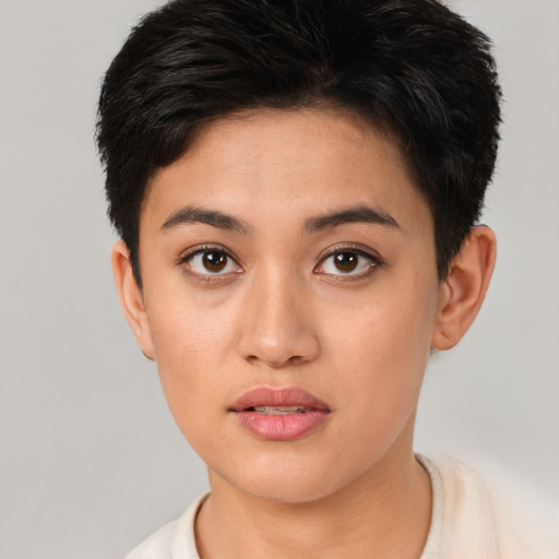 Neutral white young-adult female with short  brown hair and brown eyes