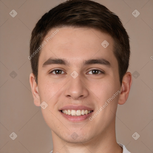 Joyful white young-adult male with short  brown hair and brown eyes