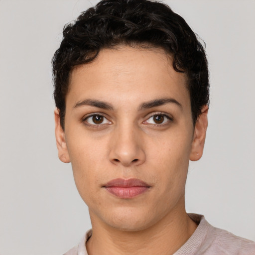 Neutral white young-adult female with short  brown hair and brown eyes