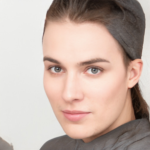 Neutral white young-adult female with short  brown hair and brown eyes