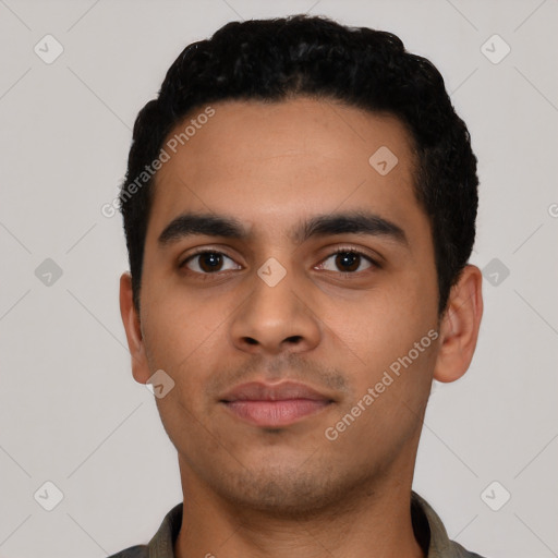 Neutral latino young-adult male with short  black hair and brown eyes