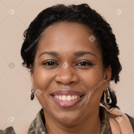 Joyful latino adult female with short  brown hair and brown eyes