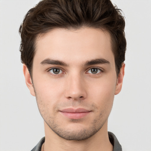 Neutral white young-adult male with short  brown hair and brown eyes