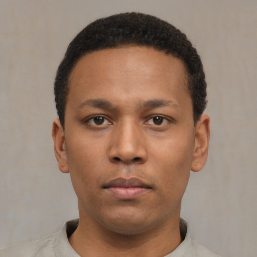 Neutral latino young-adult male with short  brown hair and brown eyes