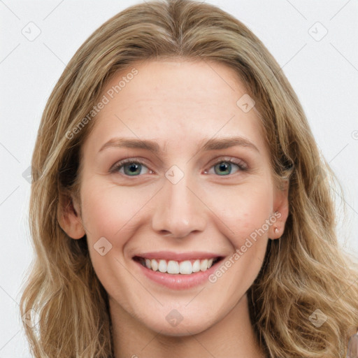 Joyful white young-adult female with long  brown hair and blue eyes