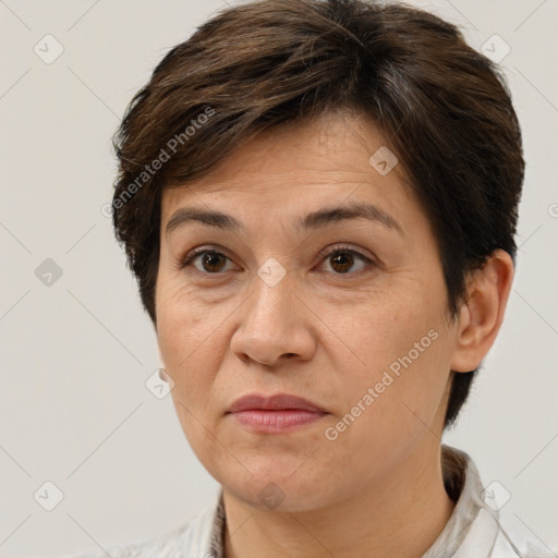 Joyful white adult female with short  brown hair and brown eyes