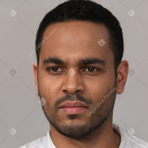 Neutral black young-adult male with short  black hair and brown eyes