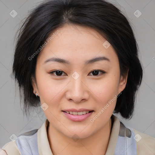 Joyful asian young-adult female with medium  brown hair and brown eyes